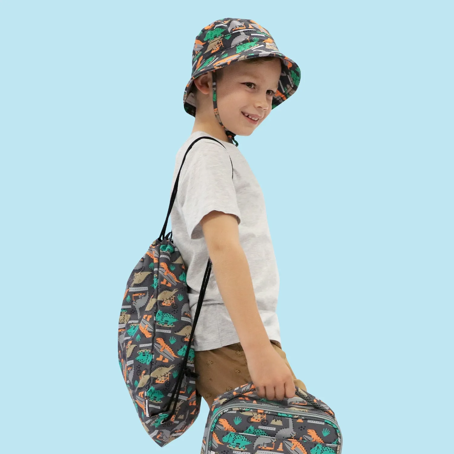 OUT & ABOUT DINO SKATE DRAWSTRING BAG