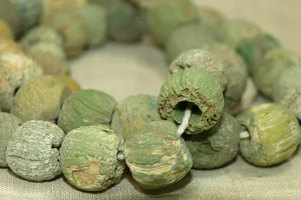 Strand of Very Worn Chartreuse Majapahit Beads