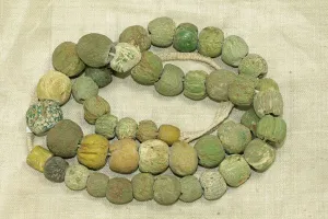 Strand of Very Worn Chartreuse Majapahit Beads